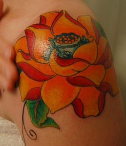 Lotus shoulder tattoo